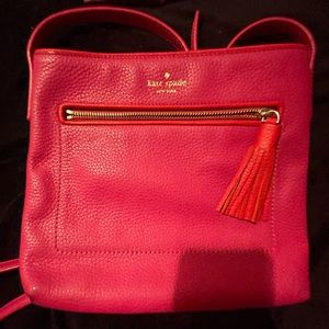 A hot pink Kate spade bag.